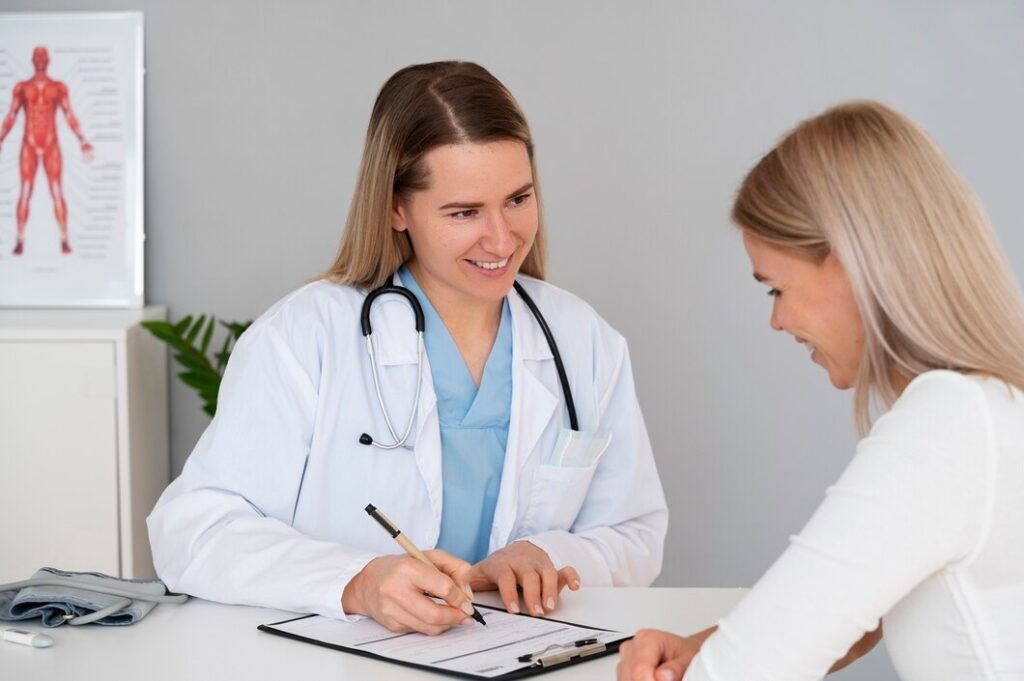 Photo of a doctor performing a physical exam on a patient in a clinical setting. Image used by a medical clinic in San Bernardino to represent preventive care