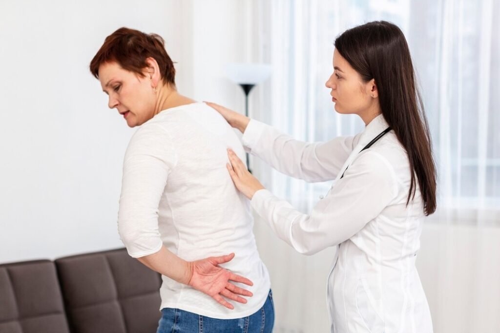 “Photo of a senior woman during a medical visit showing concern about her health. Image used by a medical clinic in San Bernardino to represent senior care and chronic condition management
